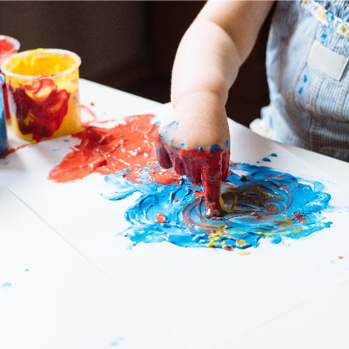 sensory-kid-fingerpainting-EMpower-In-home-physical-occupational-Manhattan-Brooklyn-NYC-NY